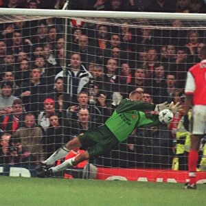 Manchester United keeper Peter Schmeichel makes a brilliant save from Arsenal