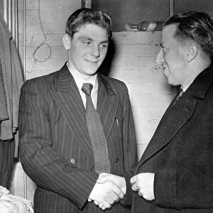 Manchester United league debutante 16 and a half years old Duncan Edwards receives