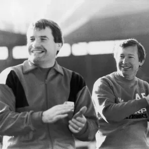 Manchester United manager Alex Ferguson with assistant Archie Knox. January 1988 Manchester United manager Alex Ferguson with assistant Archie Knox. January 1988