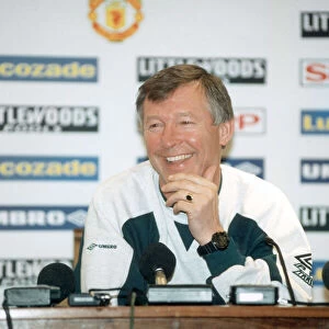 Manchester United manager Alex Ferguson in relaxed mood during a tpress conference at Old