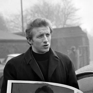 Manchester United player Denis Law arrives for training February 1969