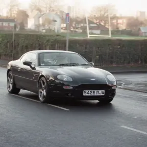 One of the Manchester United players driving their Aston Martin. 1st January 1999 One of the Manchester United players driving their Aston Martin. 1st January 1999