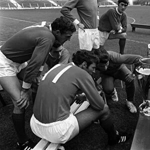 Manchester United players look at the European cup 1968 during photcall after beating