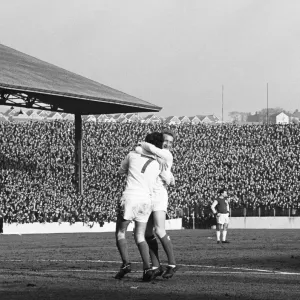 Manchester United star George Best is celebrates with team mate Denis Law after scoring Manchester United star George Best is celebrates with team mate Denis Law after scoring