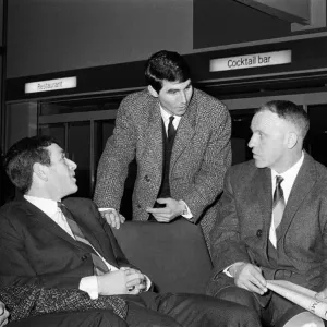 Manchester United full back Tonny Dunne chats with Liverpool manager Bill Shankly