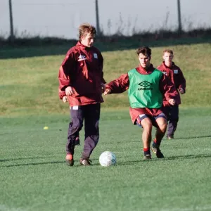 Manchester United in training. David Beckham on the ball challenged by Ben Manchester United in training. David Beckham on the ball challenged by Ben