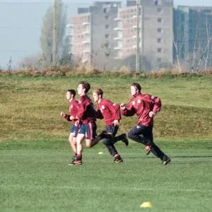 Manchester United in training. David Beckham running with Gary and Phil Neville Manchester United in training. David Beckham running with Gary and Phil Neville