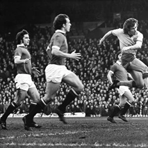 Manchester United v. Norwich. MacDougall thumps the ball past Stepney to score