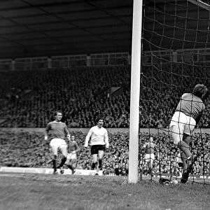 Manchester United v Sunderland-United keeper Alex Stepney is rooted to the spot as George
