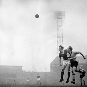Manchester United v Wolverhampton Wanderers - Billy Wright beats Viollet in the air