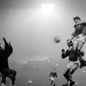 Manchester United versus Bayern Munich-Alex Dawson leaps up above Bayern