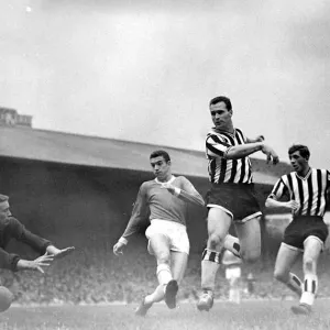 Manchester United versus Newcastle-Harry Greg dives at the ball as United are lucky not