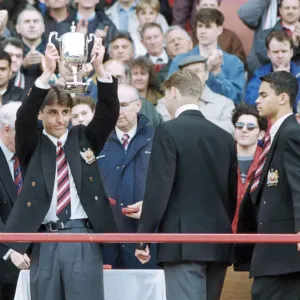 Manchester United youth team footballer Gary Neville holds aloft the Lancashire League Manchester United youth team footballer Gary Neville holds aloft the Lancashire League