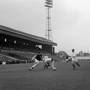 Manchester Uniteds Bobby Charlton causes problems for the Burnley defence during