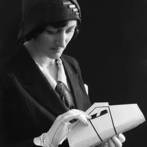 Mannequin seen here modelling the latest 1932 summer fashions. 1st July 1932