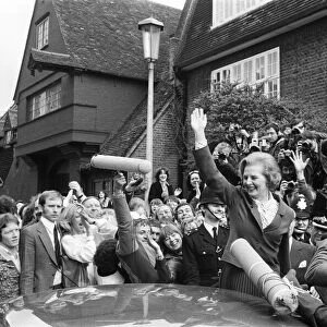Margaret Thatcher British Prime Minister waving to the crowd after leaving her home in