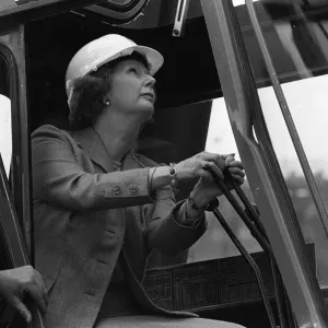Margaret Thatcher ex Prime Minister controls a crane in a building site 1986