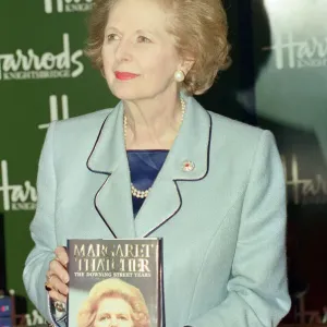 Margaret Thatcher in Harrods signing copies of her memoir