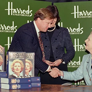 Margaret Thatcher in Harrods signing copies of her memoir "