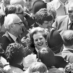 Margaret Thatcher and husband Denis surrounded by crowd