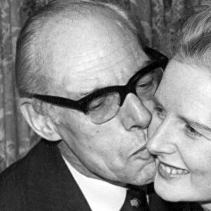 Margaret Thatcher being kissed by husband Denis celebrating her election as leader of