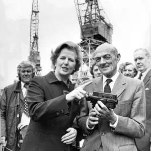 Margaret Thatcher presents Danny Brown with his retirement gift Margaret Thatcher presents Danny Brown with his retirement gift
