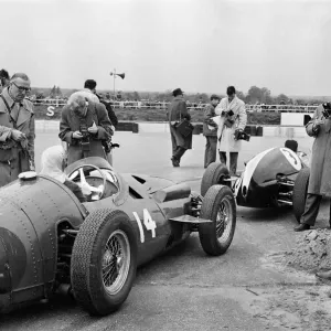Maria Teresa de Filippis pictured in her Red Maserati 250F before she puts her crash Maria Teresa de Filippis pictured in her Red Maserati 250F before she puts her crash