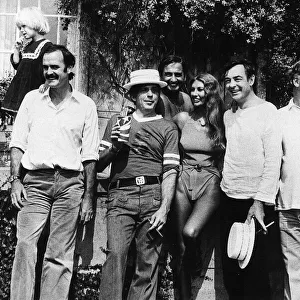 Marilyn Cole former Playmate of the Year with (left to right) John Cleese, Victor Lownes
