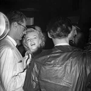 Marilyn Monroe with husband Arthur Miller at London airport, July 1956