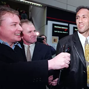 Mark Hateley arrives at Glasgow Airport to re-sign for Rangers Football Club speaking to