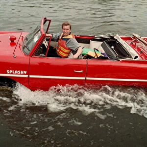 Mark Perkins from Ascot and his 1964 Amphicar March 1998 On the river Thames at