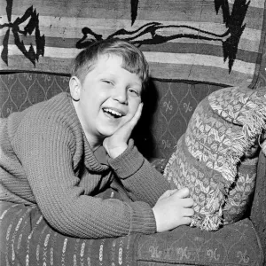 Mark Woodward, aged 8, the son of pop star Tom Jones, pictured at home in Treforest