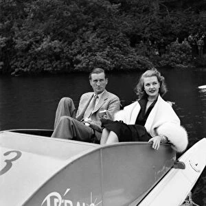 Marquess of bath with mary castle in a pedalo boat on the lake at longleat park