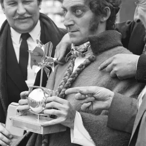 Marty Feldman seen here on his return from the Monteaux TV awards with his award for best Marty Feldman seen here on his return from the Monteaux TV awards with his award for best