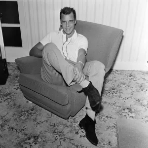 Marty Wilde at home in his flat in Chiswick, London. 21st April 1960 Marty Wilde at home in his flat in Chiswick, London. 21st April 1960