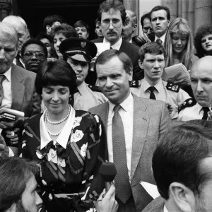 Mary and Jeffrey Archer show their delight in the crowd outside the High Court as they Mary and Jeffrey Archer show their delight in the crowd outside the High Court as they