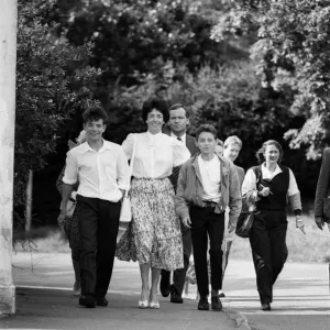 Mary and Jeffrey Archer walking home from church with their sons William and James Mary and Jeffrey Archer walking home from church with their sons William and James