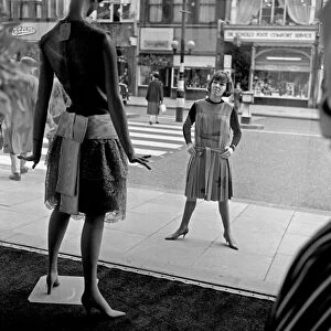 Mary Quant, clothes designer, standing outside her shop Bazaar