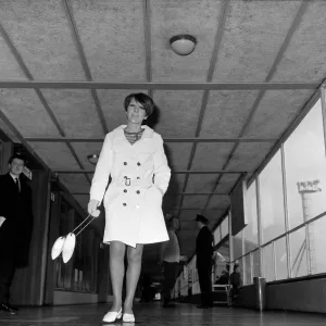 Mary Quant at London Heathrow Airport on her way to Copenhagen, wearing a short coat Mary Quant at London Heathrow Airport on her way to Copenhagen, wearing a short coat