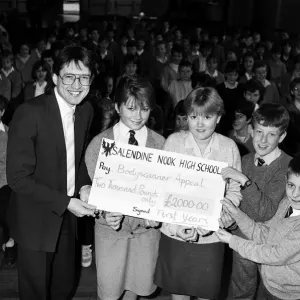 A massive cheque for a massive amount! First year pupils at Salendine Nook High School
