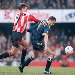 Mathew Le Tissier of Southampton tackles Dean Blackwell of Wimbledon during the two Mathew Le Tissier of Southampton tackles Dean Blackwell of Wimbledon during the two