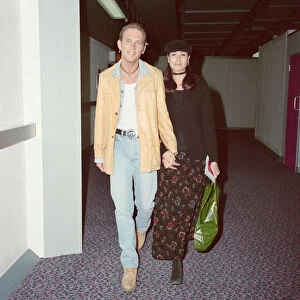 Matt Goss from the pop group Bros, and his girlfriend, model Melanie Sykes arrive