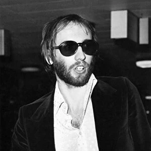 Maurice Gibb of the Bee Gees pop group leaves for Ibiza. Heathrow Airport. April 1973