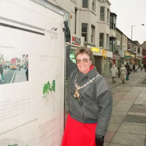 Mayor of Langbaurgh Brenda Forster unveils a poster in their fight against anti
