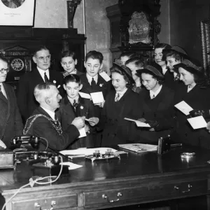 Print of Newport Mayor receiving gifts from school children, 6th February 1942