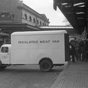 Meat being loaded into a insulated meat van of F G Jephcott in Coventry Circa 1947 Meat being loaded into a insulated meat van of F G Jephcott in Coventry Circa 1947