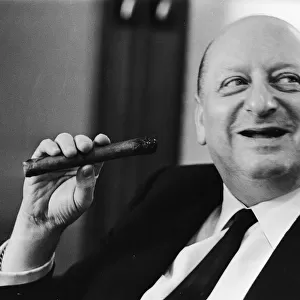 Media Mogul Lord Lew Grade smoking a cigar. 24th January 1967