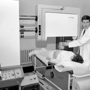 Medical Pregnancy Equipment. Dr. Stewart Campbell using the ultra-sonic scanner machine Medical Pregnancy Equipment. Dr. Stewart Campbell using the ultra-sonic scanner machine