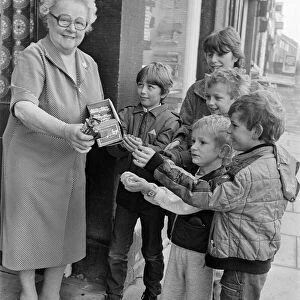 Meltham newsagent Mrs Annie Woodhead pictured keeping up the village tradition of giving