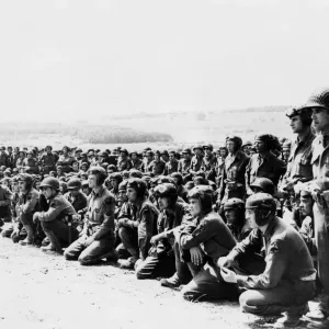 Members of an American armoured unit at marshalling a area somewhere in England Members of an American armoured unit at marshalling a area somewhere in England